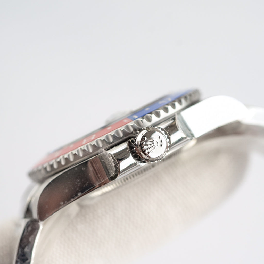Rolex GMT-Master II with a black dial and a blue and red ceramic bezel